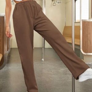 High waisted brown sweat pants. Very stretchy.